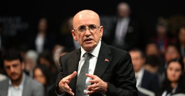 Treasury and Finance Minister Mehmet Şimşek speaks during a panel on the sidelines of the Antalya Diplomacy Forum, Antalya, southern Türkiye, April 11, 2025. (AA Photo)