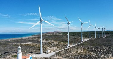Wind turbines are seen in the Bozcaada district of Çanakkale province, northwestern Türkiye, Oct. 20, 2024. (AA Photo)
