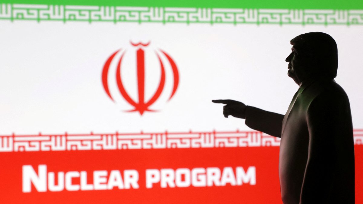 A 3D-printed miniature model depicting U.S. President Donald Trump, Iran flag and a word &amp;quot;Nuclear program&amp;quot; in this illustration taken, April 17, 2025. (Reuters Photo)