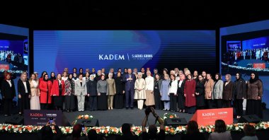 Participants of KADEM&#039;s 5th General Assembly take a photo with President Recep Tayyip Erdoğan (C) at the end of the event, Istanbul, Türkiye, April 19, 2025. (AA Photo)