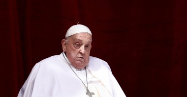 Pope Francis appears on a balcony at St. Peter&#039;s Square, on Easter Sunday, in the Vatican, April 20, 2025. (Reuters Photo)