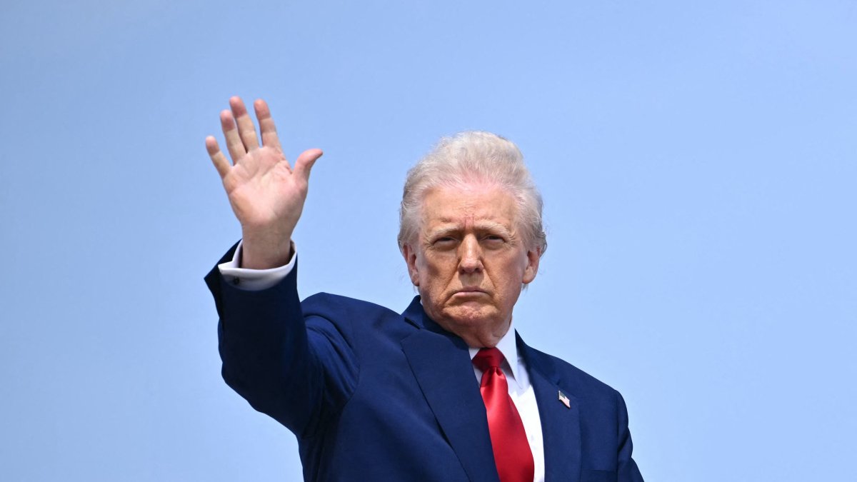U.S. President Donald Trump waves as he boards Air Force One at Joint Base Andrews in Maryland, U.S., April 3, 2025. (AFP Photo)