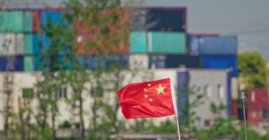 A Chinese flag is seen on the Shanghai Container Terminal, Shanghai, China, 18 April 2025. (EPA Photo)