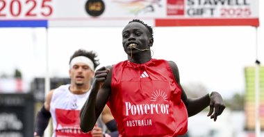 Australia&#039;s Gout Gout (R) competes during heat 6 of the men&#039;s 120m during the Stawell Gift semifinals at Central Park, Stawell, Australia, April 21, 2025. (AP Photo)