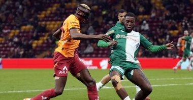 Galatasaray's Victor Osimhen (L) in action with Konyaspor's Hamidou Keyta during the Turkish match at the RAMS Park, Istanbul, Türkiye, Feb. 20, 2025. (IHA Photo)