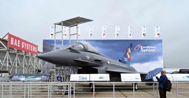 A person looks at a Eurofighter Typhoon on the opening day of the Farnborough International Airshow 2024, southwest of London, U.K., July 22, 2024. (AFP Photo)