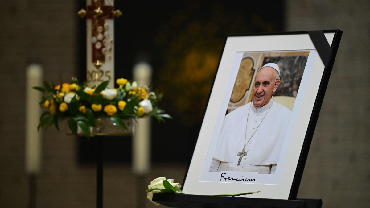 A photo of Pope Francis is displayed in the St. Thomas Aquinas (Academy) Church, Berlin, Germany, April 21, 2025. (AFP Photo)