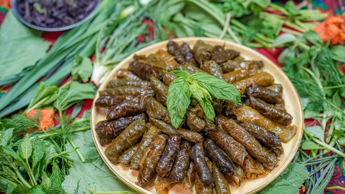 A selection of traditional Turkish dishes made with herbs from Hevsel Gardens, Diyarbakır, Türkiye, April 15, 2025. (AA Photo)