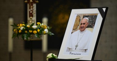 A photo of Pope Francis is displayed in the St. Thomas Aquinas (Academy) Church, Berlin, Germany, April 21, 2025. (AFP Photo)