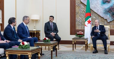 Foreign Minister Hakan Fidan (2nd L) is received by Algerian President Abdelmadjid Tebboune (R) at the Presidential Palace, Algiers, Algeria, April 21, 2025. (AA Photo)