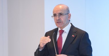 Treasury and Finance Minister Mehmet Şimşek speaks during an OECD event in Istanbul, Türkiye, April 10, 2025. (AA Photo)
