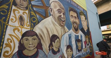 The late Pope Francis is depicted on a mural alongside football player Lionel Messi in the Carlos Mugica neighborhood, Buenos Aires, Argentina, April 21, 2025. (AP Photo)