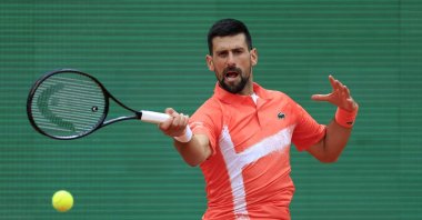 Serbia&#039;s Novak Djokovic in action during his ATP Masters 1000 Monte Carlo Masters round of 32 match against Chile&#039;s Alejandro Tabilo at the Monte Carlo Country Club, Roquebrune-Cap-Martin, France, April 9, 2025. (Reuters Photo)