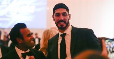 Entrepreneur Vivek Ramaswamy (L) talks with Enes Kanter Freedom (R) before President-elect Donald Trump speaks at his Mar-a-Lago estate, Florida, U.S., Nov. 14, 2024. (AP Photo)