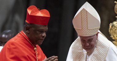 Pope Francis with Archbishop of Kinshasa, Fridolin Ambongo Besungu, during the ordinary public Consistory for the creation of new Cardinals in Saint Peters Basilica at the Vatican, Oct. 5, 2019. (EPA Photo)