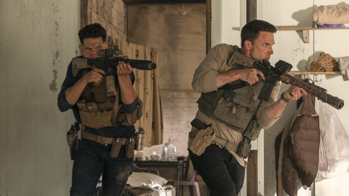 This image released by Amazon shows Jon Bernthal (L) and Ben Affleck in a scene from &quot;The Accountant 2.&quot; (AP Photo)