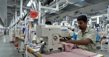 An employee sews garments inside a garment factory in Katunayake on the outskirts of Colombo, Sri Lanka, April 3, 2025. (Reuters Photo)