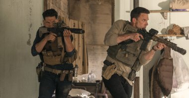 This image released by Amazon shows Jon Bernthal (L) and Ben Affleck in a scene from &quot;The Accountant 2.&quot; (AP Photo)