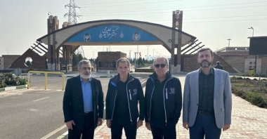 International Atomic Energy Agency (IAEA) Director General Rafael Grossi and the deputy chief of the Atomic Energy Organisation of Iran, Behrouz Kamalvandi, stand in front of the Fordow facility near Qom, Qom province, in Iran, in this handout distributed Nov. 15, 2024. (International Atomic Energy Agency/Handout via Reuters)