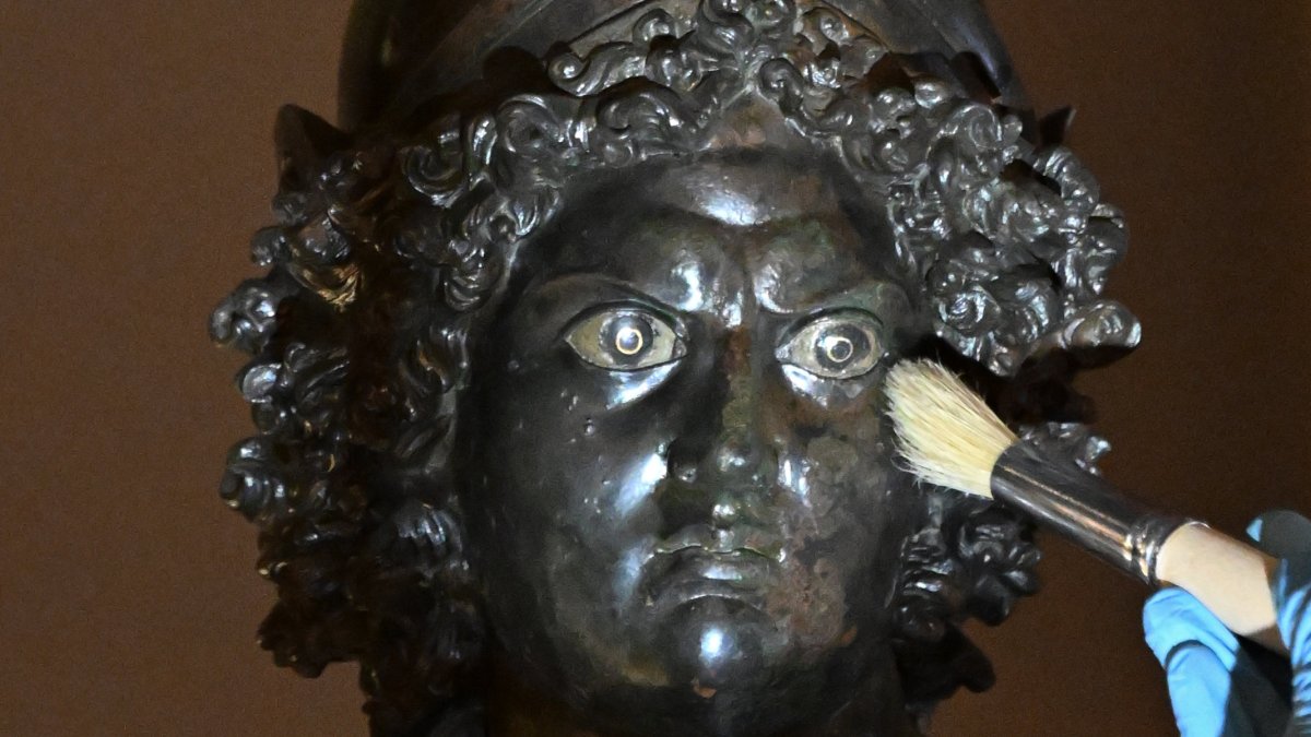 The bronze statue of Mars, a symbol of fertility and power, is undergoing careful restoration at the Zeugma Mosaic Museum, Gaziantep, Türkiye, April 17, 2025. (AA Photo)