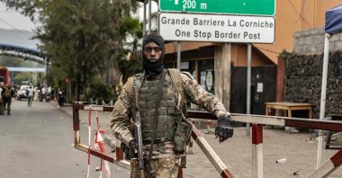 A member of the M23 armed group monitors access to the border post crossing into Rwanda in Goma, DR Congo, Jan. 29, 2025. (AFP Photo)