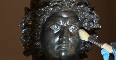 The bronze statue of Mars, a symbol of fertility and power, is undergoing careful restoration at the Zeugma Mosaic Museum, Gaziantep, Türkiye, April 17, 2025. (AA Photo)