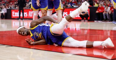 Golden State Warriors&#039; Jimmy Butler III goes to the floor after being fouled by Houston Rockets&#039; Amen Thompson in the first half in Game Two of the Western Conference First Round NBA Playoffs at Toyota Center, Houston, U.S., April 23, 2025. (AFP Photo)