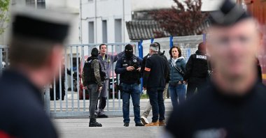 French security officers secure the area during a visit by French ministers following  a knife attack in which one student was killed and three other were wounded at the Notre-Dame de Toutes-Aides high school, in Nantes, western France, April 24, 2025. (AFP Photo)