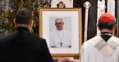 Filipino cardinal Luis Antonio Gokim Tagle (R) attends a rosary prayer next to a portrait of late Pope Francis at Santa Maria Maggiore Basilica in Rome, Italy, April 24, 2025. (AFP Photo)