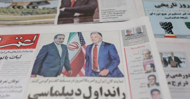 An Iranian newspaper with a cover photo of Iran&#039;s Foreign Minister Abbas Araghchi and U.S. Middle East envoy Steve Witkoff is seen in Tehran, Iran, April 12, 2025. (Reuters Photo)