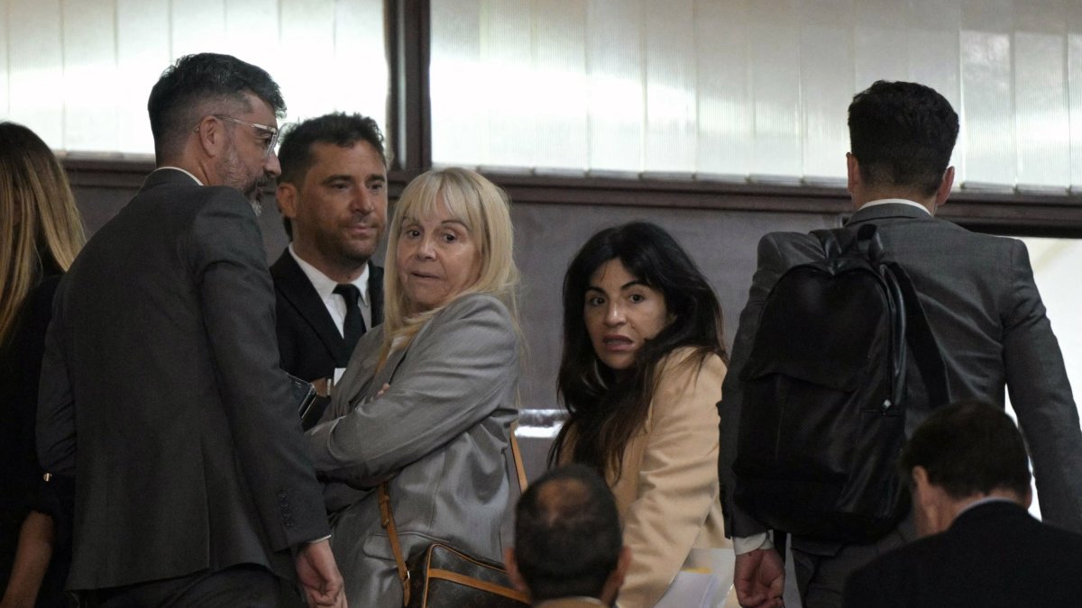 Giannina Maradona (R) and Claudia Villafane, daughter and former wife of Argentine football legend Diego Maradona, respectively, arrive at the court for a trial hearing on her father&#039;s death, San Isidro, Buenos Aires, April 15, 2025. (AFP Photo)