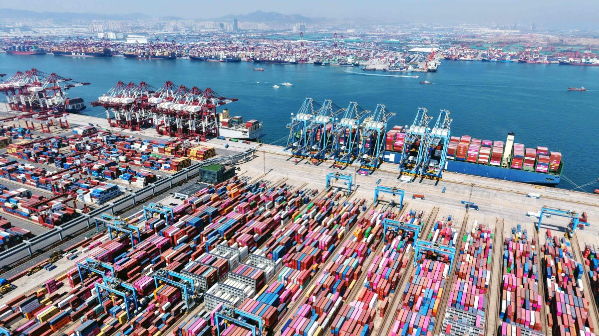 Container ships are seen at the port in Qingdao, eastern Shandong province, China, April 15, 2025. (AFP Photo)