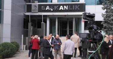 People wait outside the Beylikdüzü municipality building, Istanbul, Türkiye, March 26, 2025. (DHA Photo)