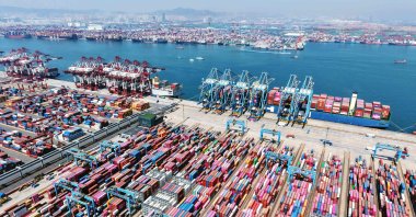 Container ships are seen at the port in Qingdao, eastern Shandong province, China, April 15, 2025. (AFP Photo)