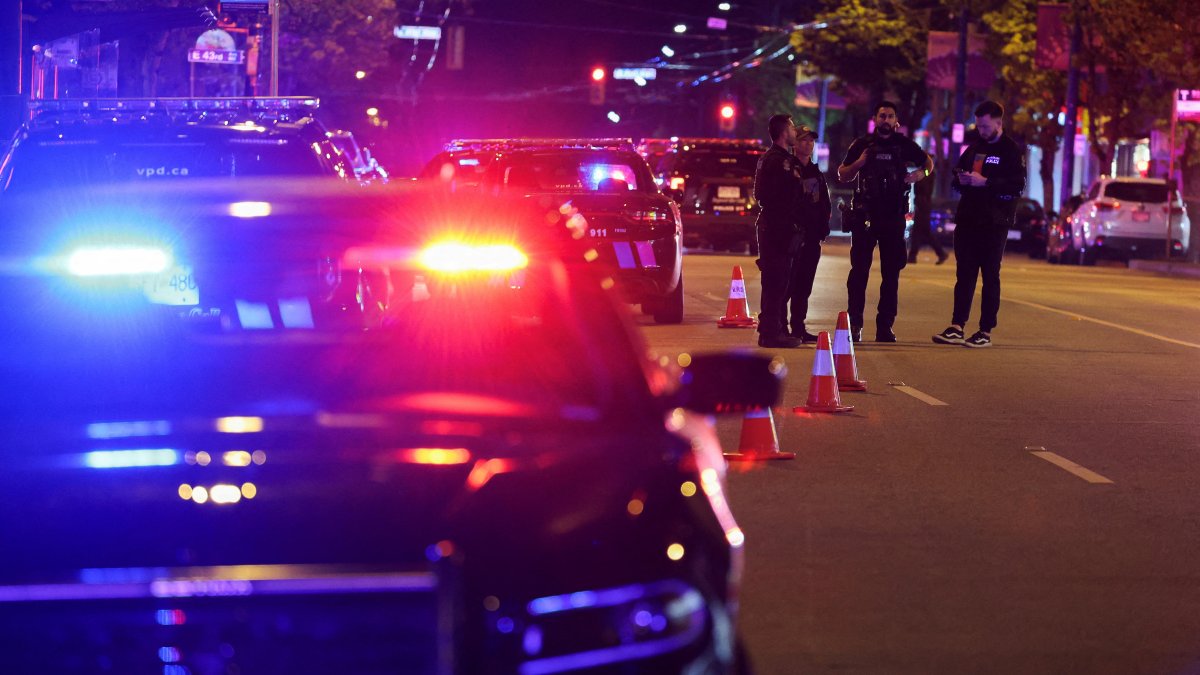 Police officers work at the scene after a vehicle drove into a crowd at the Lapu Lapu day block party, in what police say has left multiple people killed and injured, in Vancouver, Canada, April 26, 2025. (Reuters Photo)