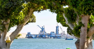 A cargo ship sails along the Suez Canal near Ismailia, Egypt, April 16, 2025. (AFP Photo)