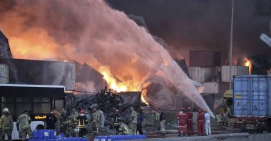 Firefighters try to extinguish the fire after a massive explosion and fire rocked a port near the southern port city of Bandar Abbas, Iran, April 27, 2025. (AP Photo)