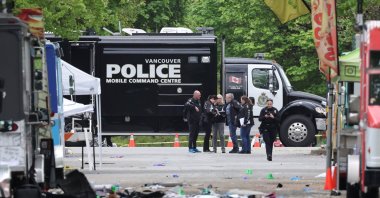 Police officers work at the scene, the morning after a vehicle was driven into a crowd at a Filipino community Lapu Lapu Day block party, Vancouver, Canada, April 27, 2025. (Reuters Photo)