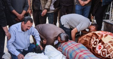 Relatives mourn over the bodies of the Al-Khour family in the yard of the Al-Shifa hospital after their house was hit by an Israeli strike, Gaza City, Palestine, April 26, 2025. (AFP Photo)
