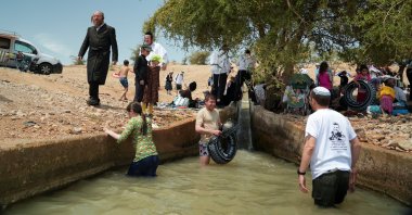 Illegal Israeli settlers swim in Al-Ouja, near Jericho in the Israeli-occupied West Bank, Palestine, April 16, 2025. (Reuters Photo)
