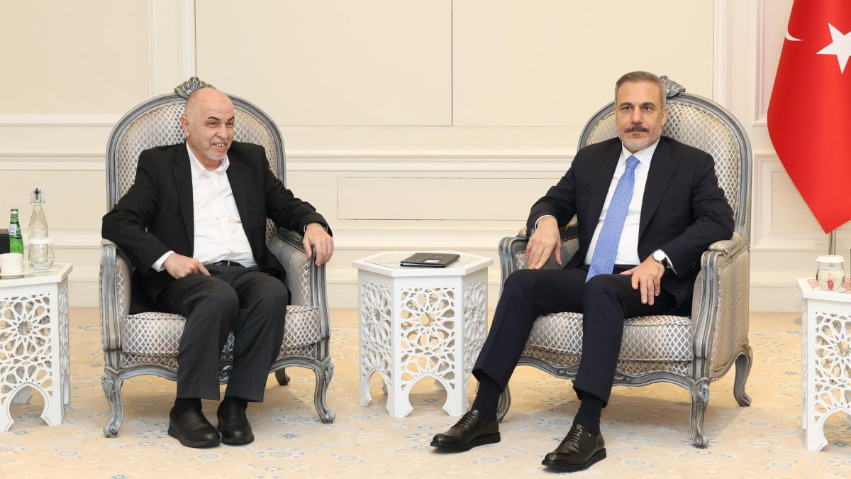 Turkish Foreign Minister Hakan Fidan (R) meets with Muhammad Ismail Darwish, head of the Hamas Shura Council, Doha, Qatar, April 27, 2025. (AA Photo)