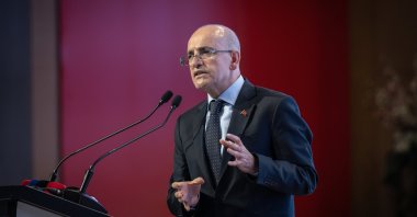 Treasury and Finance Minister Mehmet Şimşek speaks during an event in Ankara, Türkiye, April 7, 2025. (AA Photo)