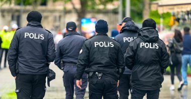 Turkish police officers walking on a street, Istanbul, Türkiye, May 1, 2024. (Shutterstock Photo)