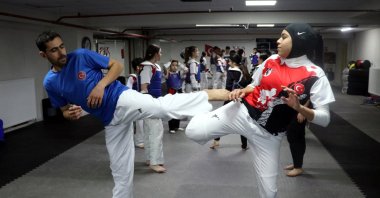 Türkiye&#039;s deaf taekwondo national athlete and Olympic bronze medalist Yasin Çimen (L) trains ahead of the Deaflympics, Istanbul, Türkiye, April 29, 2025. (AA Photo)
