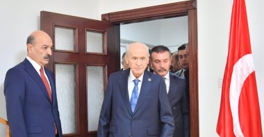 Nationalist Movement Party (MHP) leader Devlet Bahçeli (R) arrives for an event in the capital Ankara, Türkiye, April 4, 2025. (AA Photo)