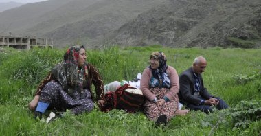 Villagers rest in a green patch at the village in Hakkari, southeastern Türkiye, April 29, 2025. (AA Photo)