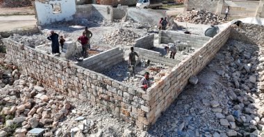 A drone view shows people rebuilding their house in Aleppo, Syria, April 19, 2025. (Reuters Photo)