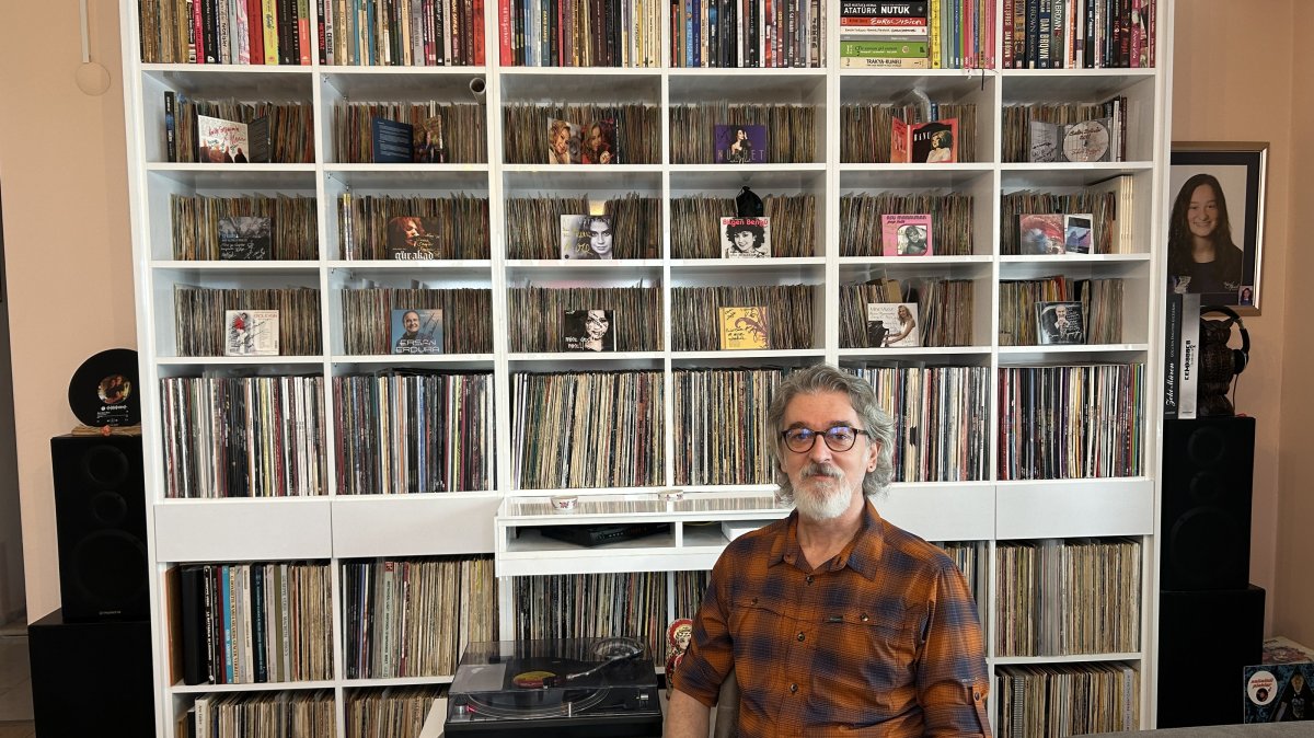 Music producer Naci Keklik poses with his vinyl collection, Istanbul, Türkiye, April 16, 2025. (AA Photo)