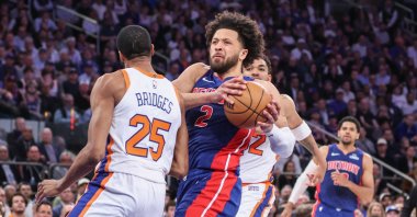 Detroit Pistons&#039; Cade Cunningham (C) drives against New York Knicks&#039; Mikal Bridges (L) in the fourth quarter during Game 5 of the first round for the 2025 NBA Playoffs at Madison Square Garden, New York City, U.S., April 29, 2025. (Reuters Photo)
