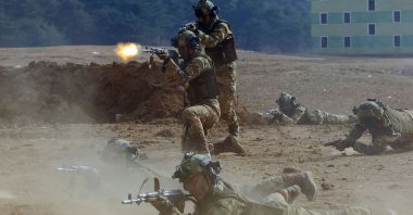 North Korean troops take part in training exercises at an undisclosed location in North Korea, April 28, 2025. (AFP Photo)